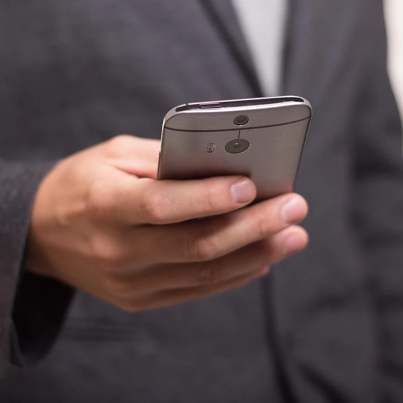 Smartphone showing a missed call notification for a Cumming GA business