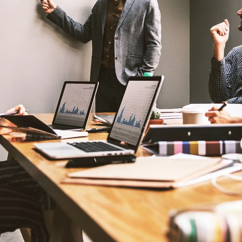 Cumming GA business team reviewing their redesigned website on a monitor